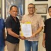 AJP Serahkan Mandat DPC MKGR Butur kepada Firdaus Jamaluddin
